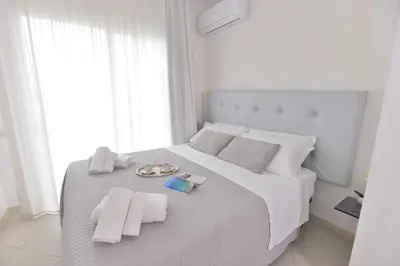 Letto o letti in una camera di IzzHome New One