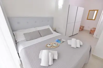 Letto o letti in una camera di IzzHome New One