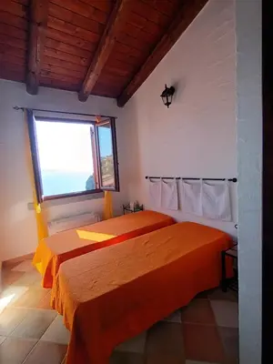 Letto o letti in una camera di La Villa Tanca Piras