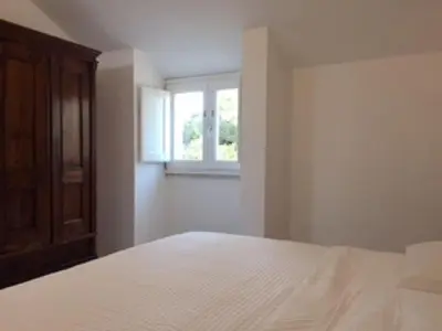 Letto o letti in una camera di Sul Mare Sardegna Villa Actea
