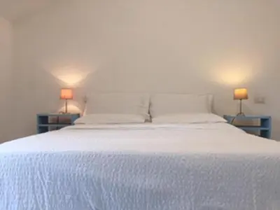 Letto o letti in una camera di Sul Mare Sardegna Villa Actea