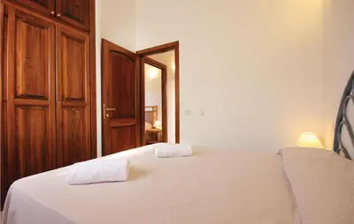 Letto o letti in una camera di Cozy Home In Costa Rei -Ca- With Wifi