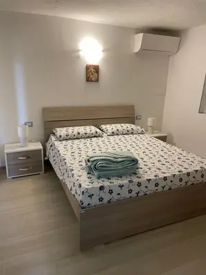Letto o letti in una camera di Casa Silvia