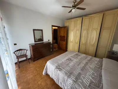 Letto o letti in una camera di Villa Candida
