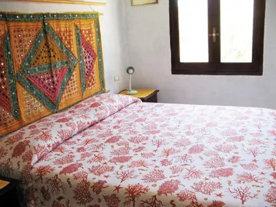 Letto o letti in una camera di Villa Bruna
