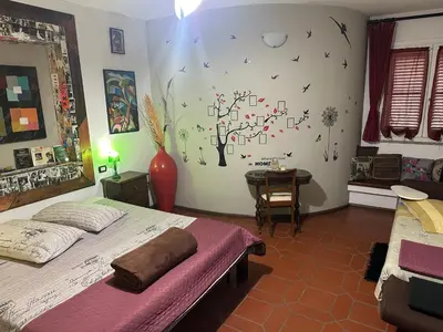 Letto o letti in una camera di B&B Filomena