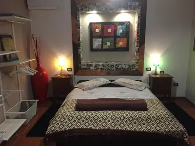 Letto o letti in una camera di B&B Filomena