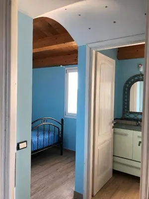 Letto o letti in una camera di B&B Il Cenerino
