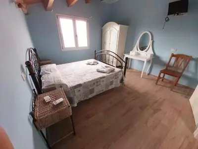 Letto o letti in una camera di B&B Il Cenerino