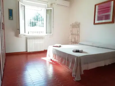 Letto o letti in una camera di Villa Maria Apartment