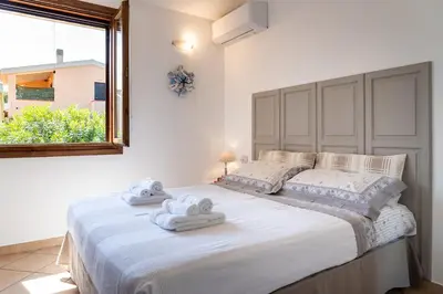 Letto o letti in una camera di Villa Laura