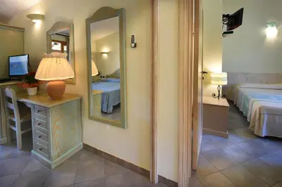 Letto o letti in una camera di Hotel Su Giganti