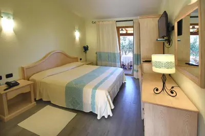 Letto o letti in una camera di Hotel Su Giganti