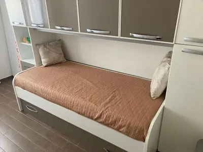 Letto o letti in una camera di Casa Tartaruga