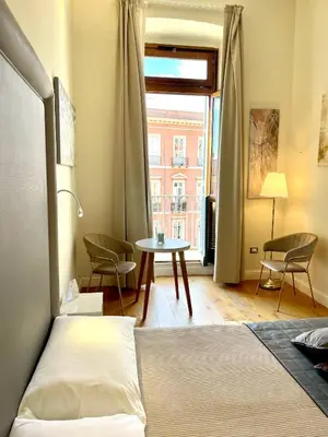 Letto o letti in una camera di Antico Corso Charme