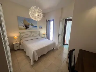 Letto o letti in una camera di Villa Grantorre