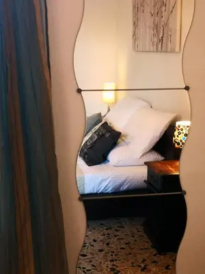 Letto o letti in una camera di Zia Chiarina