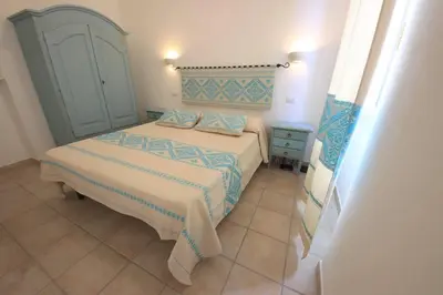 Letto o letti in una camera di ### Appartamenti sulla SPIAGGIA al POETTO ###