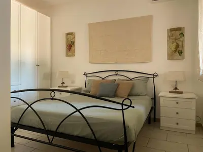 Letto o letti in una camera di Renato Apartments