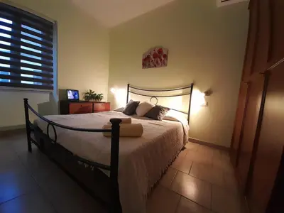 Letto o letti in una camera di Casa Giampiero