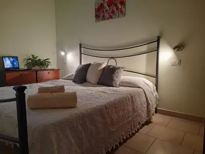 Letto o letti in una camera di Casa Giampiero