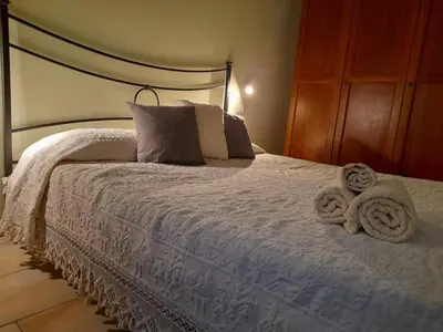 Letto o letti in una camera di Casa Giampiero