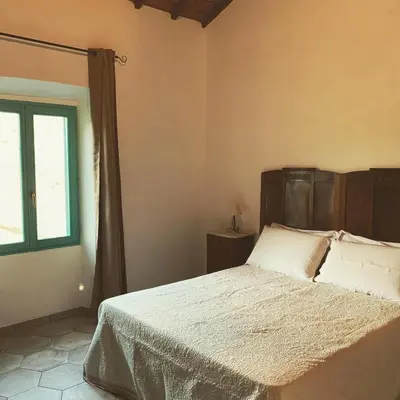 Letto o letti in una camera di Corte Boero Bed&Breakfast