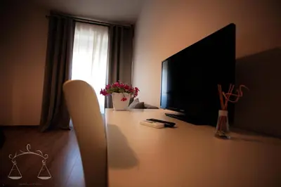 TV o dispositivi per l'intrattenimento presso La Libra Rooms