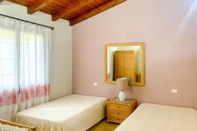 Letto o letti in una camera di Case Vacanza Bithia