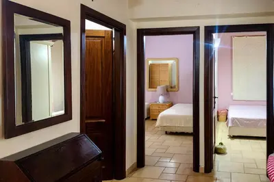 Letto o letti in una camera di Case Vacanza Bithia