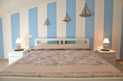 Letto o letti in una camera di Anemone Guest House