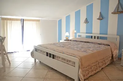 Letto o letti in una camera di Anemone Guest House