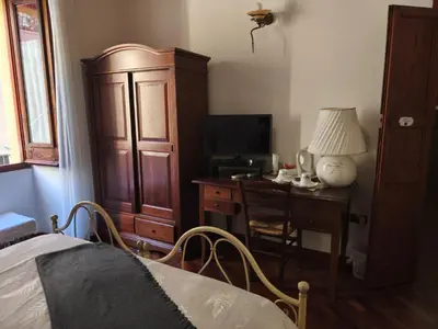 Letto o letti in una camera di B&B Federica