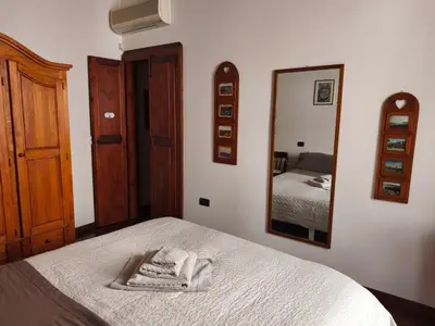Letto o letti in una camera di B&B Federica
