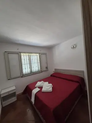 Letto o letti in una camera di La Casa Rosa