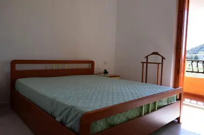 Letto o letti in una camera di Appartamento Sanders By La Via Del Mare Viaggi e Vacanze