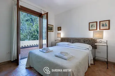 Letto o letti in una camera di Villa Emilietta