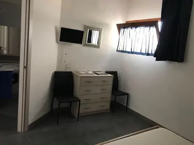 TV o dispositivi per l'intrattenimento presso Appartamento Rosmarino