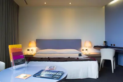 Letto o letti in una camera di UNA HOTELS T Hotel Cagliari