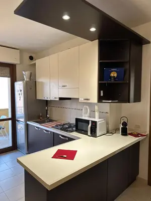 Cucina o angolo cottura di Appartamento Carino Splendido Trivano Panoramico IUN S3308