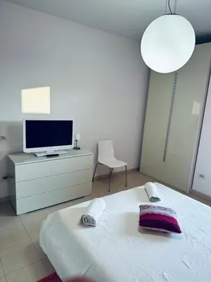 TV o dispositivi per l'intrattenimento presso Appartamento Carino Splendido Trivano Panoramico IUN S3308