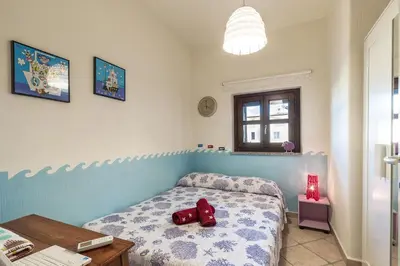 Letto o letti in una camera di Casa Vacanze Pedras