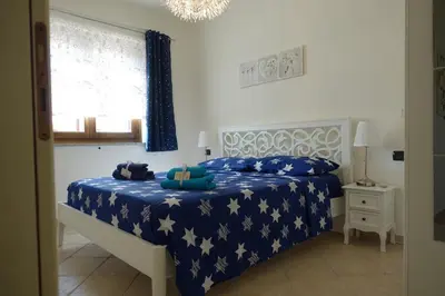 Letto o letti in una camera di Casa Vacanze Pedras