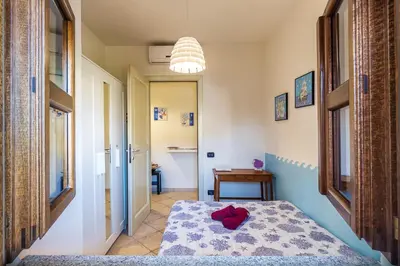 Letto o letti in una camera di Casa Vacanze Pedras