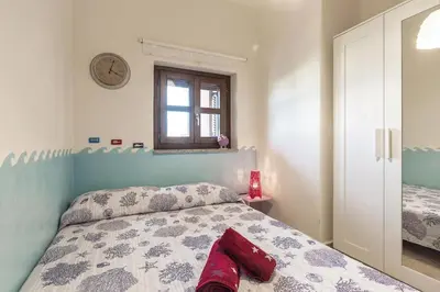 Letto o letti in una camera di Casa Vacanze Pedras