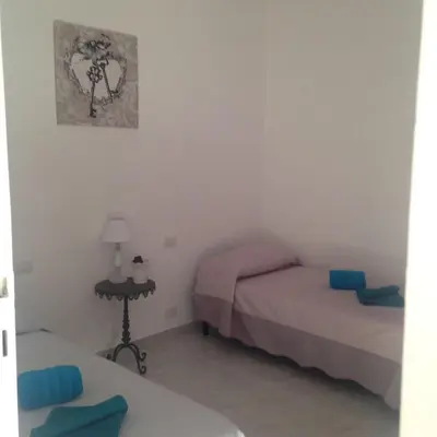 Letto o letti in una camera di Montello Sweet House IUN Q5874