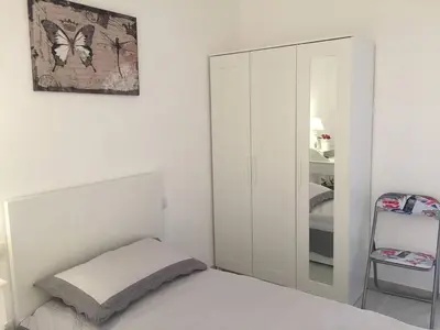 Letto o letti in una camera di Montello Sweet House IUN Q5874