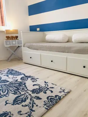 Letto o letti in una camera di Levante beach houses
