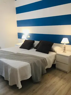 Letto o letti in una camera di Levante beach houses