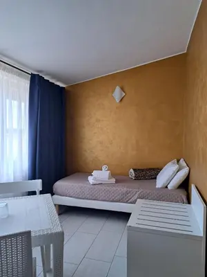 Letto o letti in una camera di Blue Velvet Rooms